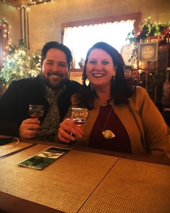 a couple doing wine tasting